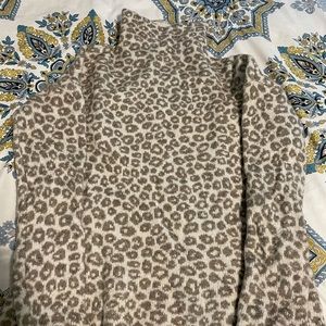 Women’s leopard print turtleneck sweater